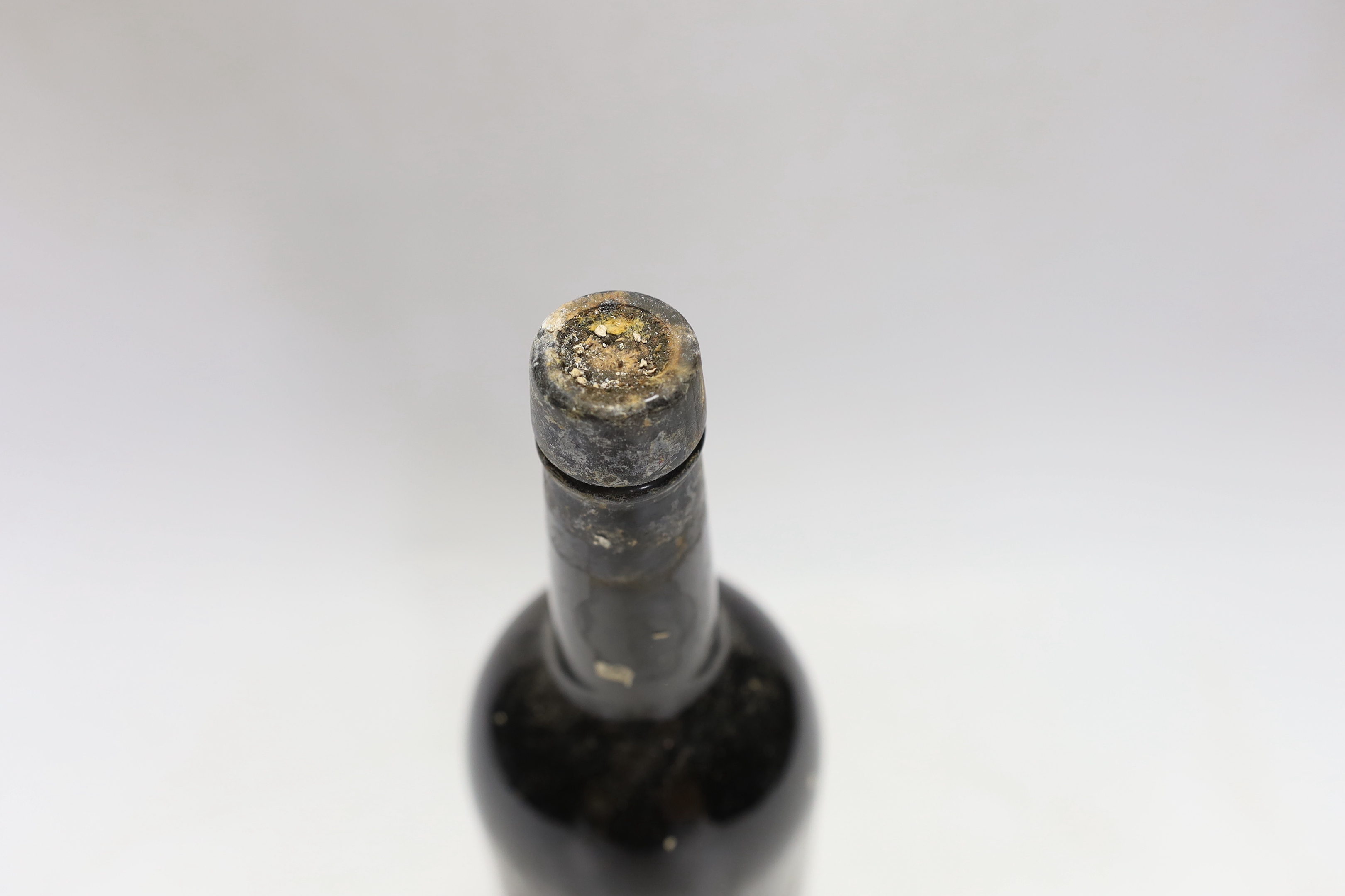 One bottle of Grahams Port, label degraded.